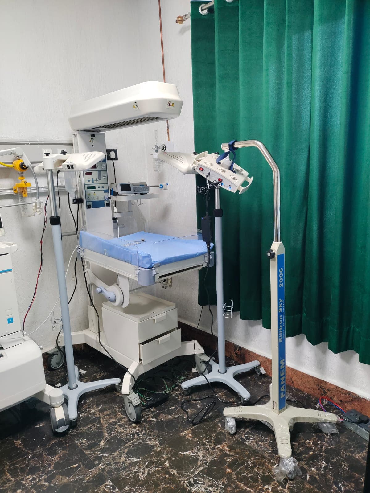 Modern temperature-controlled neonatal cot at Womb2Bloom Hospital NICU
